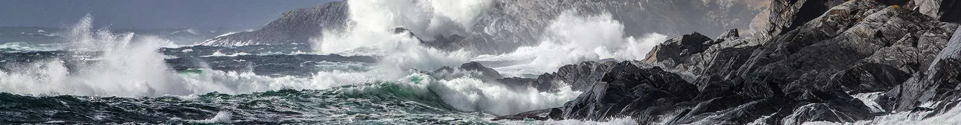 Waves hitting Norwegian shoreline by Thomas