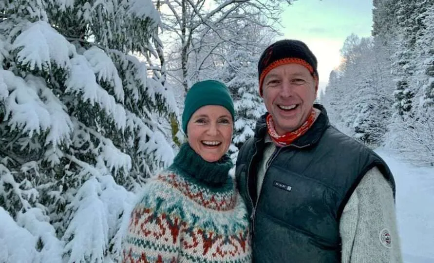 Norway travel agents Rogier and Anne in snowy forest